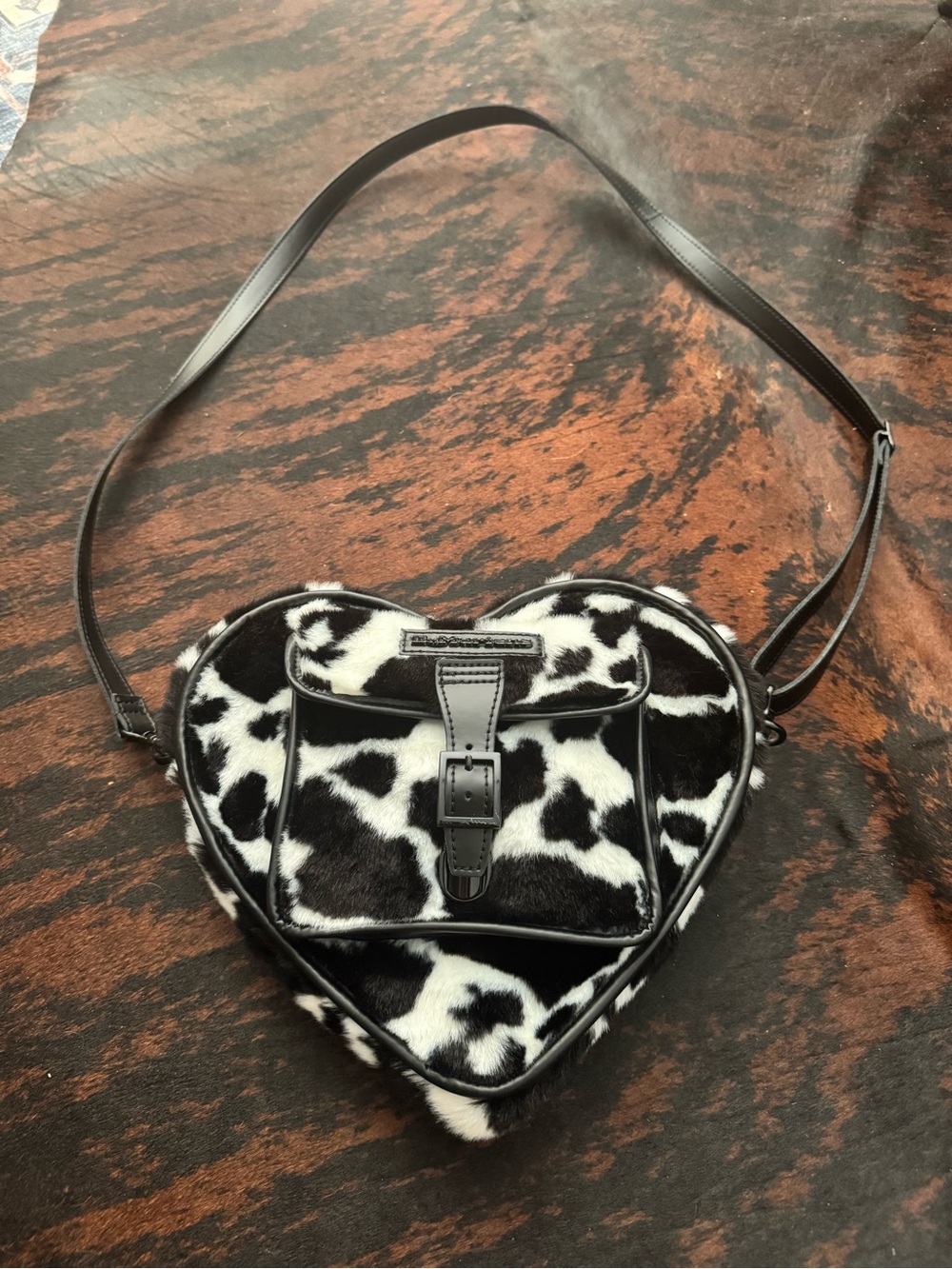 Dr. Martens Black and White Cow-Print Heart Crossbody - Picture 2 of 6